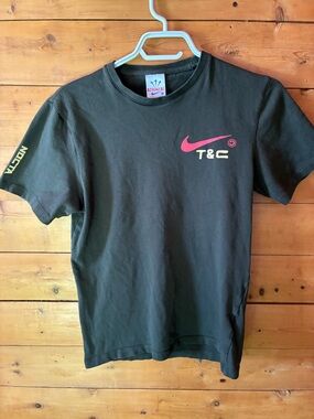 Nike Black Short-Sleeve Tee with Pink Swoosh